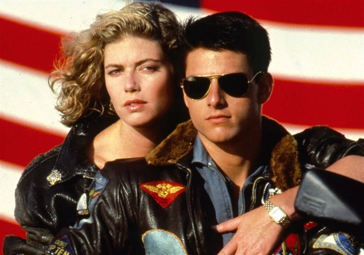 Top gun. Келли МАКГИЛЛИС 1986. Том Круз 1986. Келли МАКГИЛЛИС лучший стрелок. Том Круз Top Gun 1986.